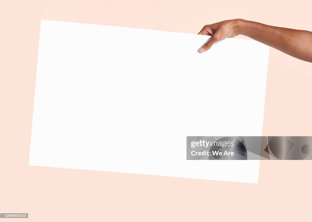 Hand holding blank sign