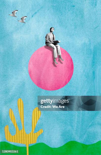 woman sitting on circle in sky - things that are round stock-fotos und bilder