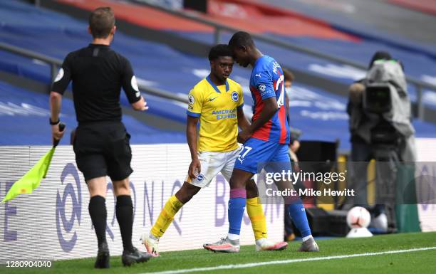 Tariq Lamptey of Brighton and Hove Albion clashes with Tyrick Mitchell of Crystal Palace during the Premier League match between Crystal Palace and...