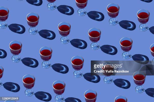 top view of wine glasses on the blue background - alcohol abuse stock pictures, royalty-free photos & images
