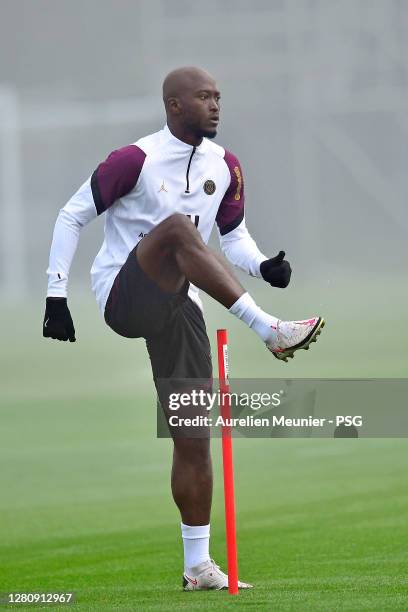 Danilo warms up during a Paris Saint-Germain training session at Ooredoo Center on October 18, 2020 in Paris, France.