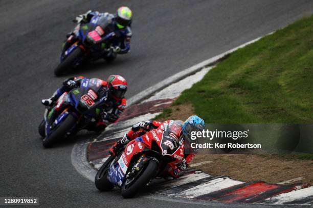 Josh Brookes of Australia and VisionTrack Ducati leads from Tarran Mackenzie of McAMS Yamaha and Jason O'Halloran of McAMS Yamaha in the final race...