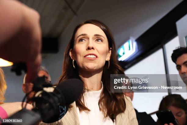 Re-elected New Zealand Prime Minister Jacinda Ardern talks to reporters from a cafe near her home in Auckland, New Zealand on 18 October 2020, the...