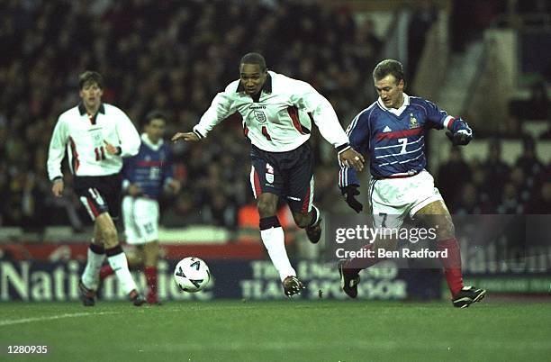 Paul Ince of England is watched by Didier Deschamps of France in the International Friendly at Wembley in London. France won 2-0. \ Mandatory Credit:...