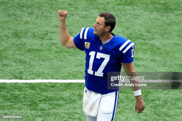 Philip Rivers of the Indianapolis Colts celebrates his teams 31-27 victory against the Cincinnati Bengals during the second half at Lucas Oil Stadium...