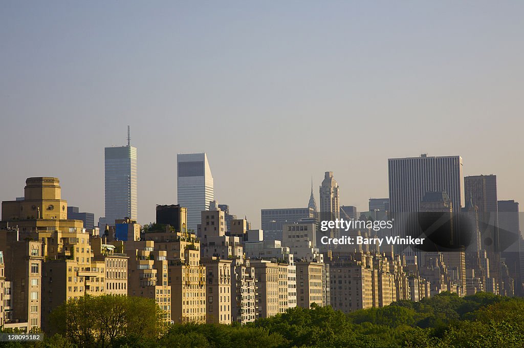 View of Manhattan's East Side (Fifth Avenue co-ops) in late afternoon looking southeast from the rooftop garden at the Metropolitan Museum of Art in Central Park, New York City