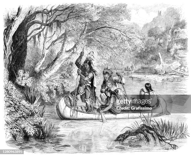 native american fishing with spear in canoe illustration - minority groups stock illustrations