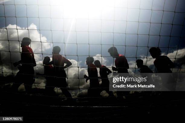 Wanderers players run during a Western Sydney Wanderers A-League pre-season training session at Wanderers Centre of Football on October 19, 2020 in...