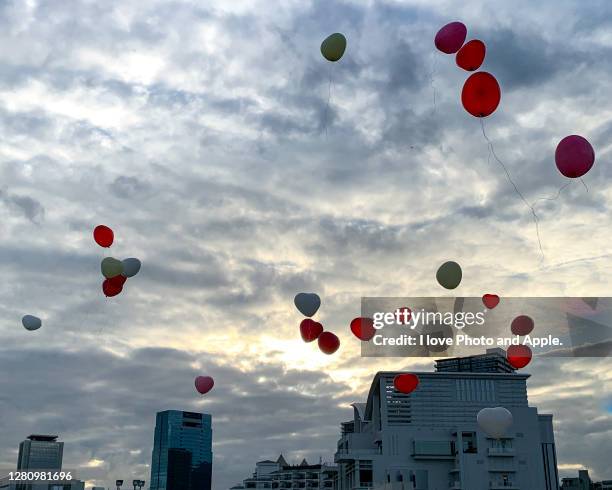 balloon release - releasing balloon stock pictures, royalty-free photos & images