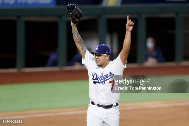 Julio Urias of the Los Angeles Dodgers celebrates after closing out the teams 4-3 victory against the Atlanta Braves in Game Seven of the National...