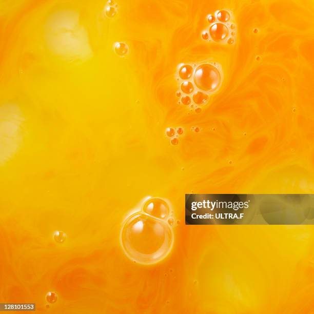 egg which was stirred - egg yolk stock pictures, royalty-free photos & images