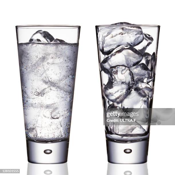 two glasses - glass ice stock pictures, royalty-free photos & images