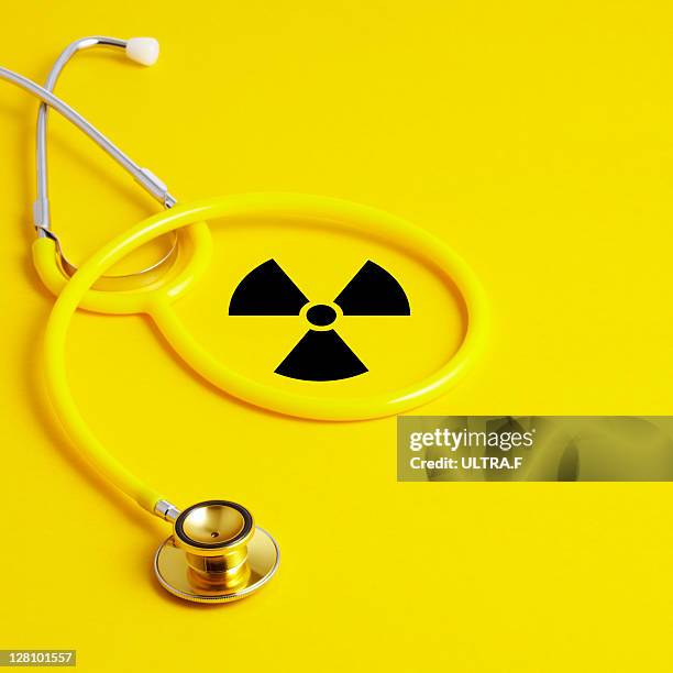 stethoscope and radioactive sign - radiation symbol stock pictures, royalty-free photos & images