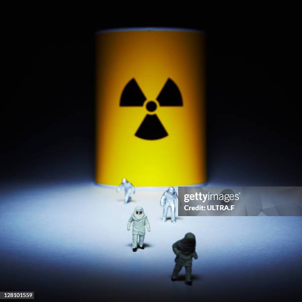 workers in nuclear power plant - radiation symbol stock pictures, royalty-free photos & images