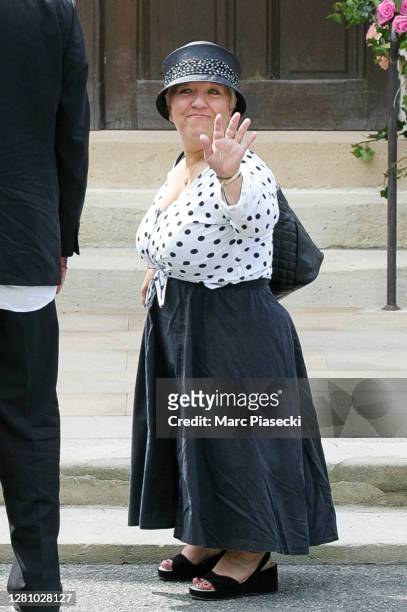 June 18: Actress Michele Mathy a.k.a. Mimie Mathy arrives at the Sainte-Eugenie church ahead Jade Hallyday's baptism on June 18, 2005 in...