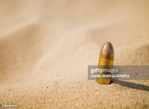 Sand Bullets Bullet Firing Close Up Photos and Premium High Res Pictures - Getty Images