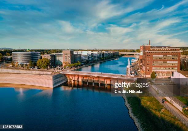 drone view of the harbour in duisburg, germany - duisburg stock pictures, royalty-free photos & images