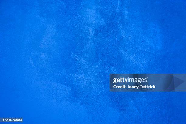 textured wall background - royal blue stock pictures, royalty-free photos & images