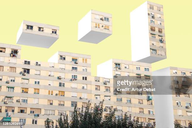 creative picture of urban blocks stacking like video game in surreal image manipulation. - apartment foto e immagini stock