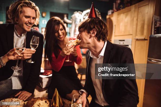 celebrating the new year's eve - men of the year party inside stock pictures, royalty-free photos & images