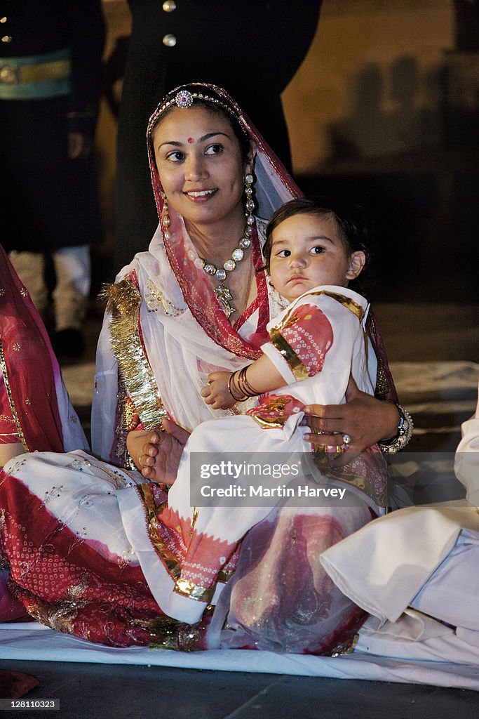 Princess Bhargavi Kumari Mewar with daughter at Holi festival. Udaipur, India.