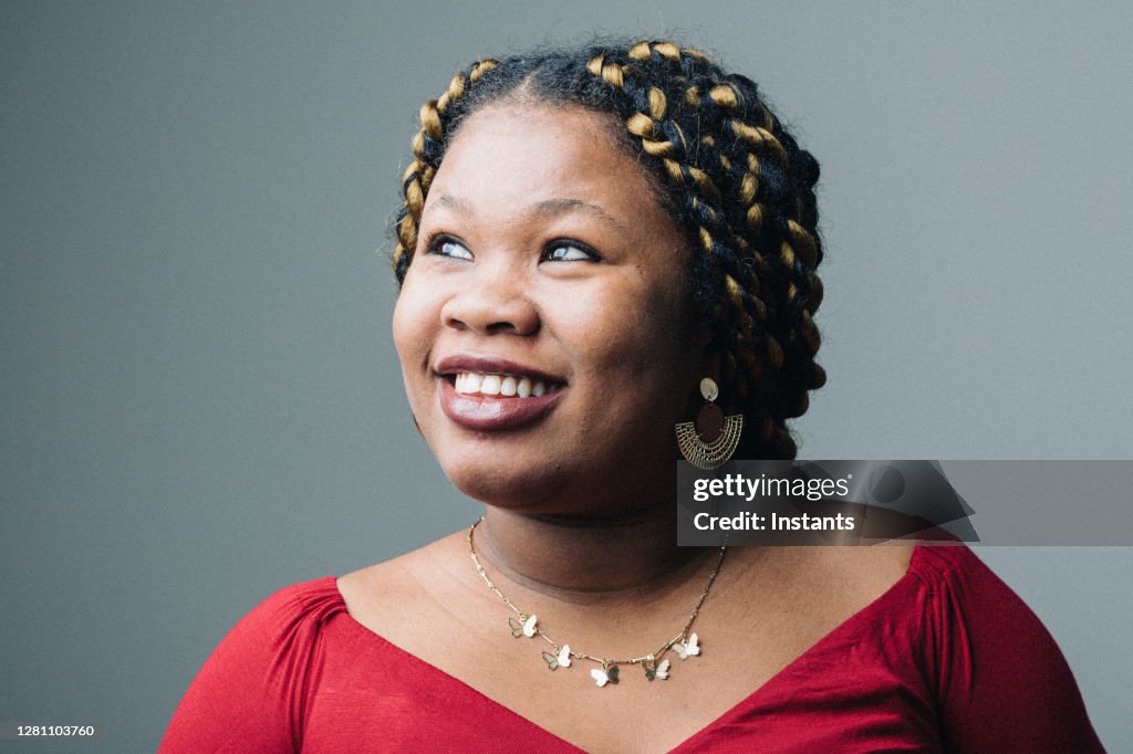 Headshot of a happy young pregnant woman, in all her beauty.