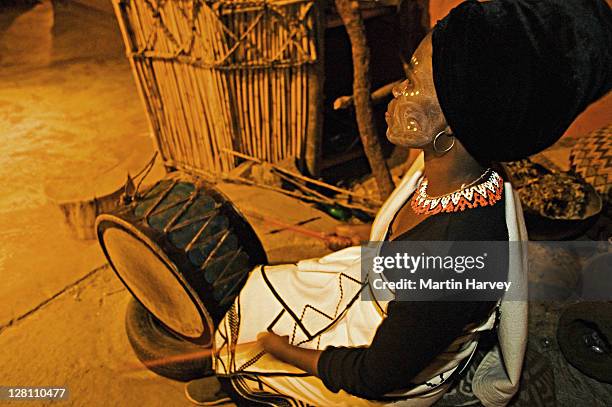 xhosa woman drummer. lesedi cultural village near johannesburg, south africa - xhosa culture stock pictures, royalty-free photos & images