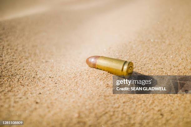 Sand Bullets 107 Bullet Shells Sand Stock Photos, High-Res Pictures, and Images ...