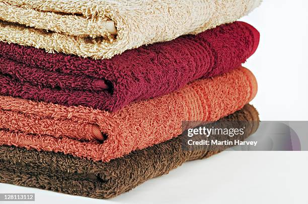 towels on white background. studio shot. - asciugamano foto e immagini stock