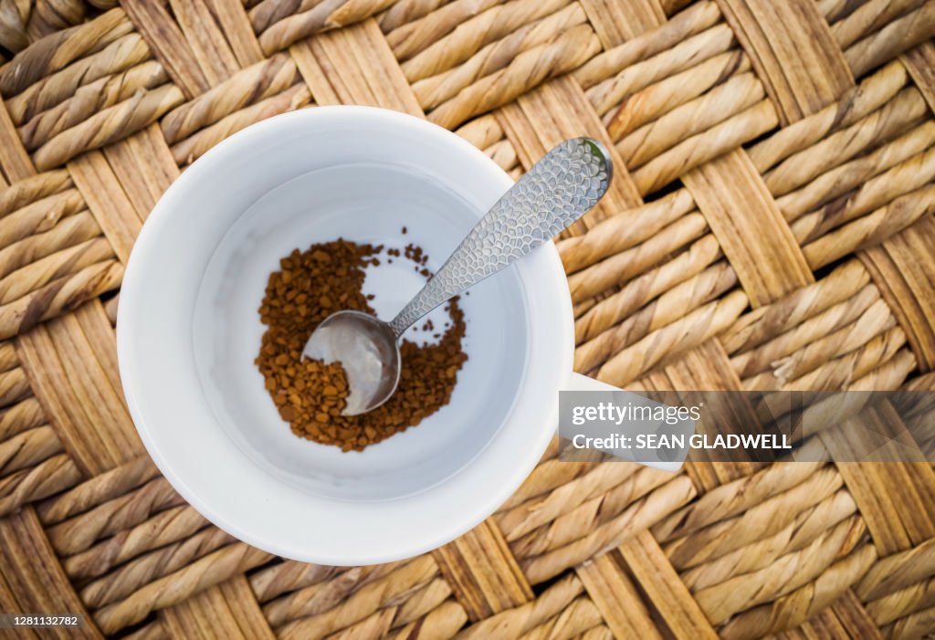 Coffee mug and spoon