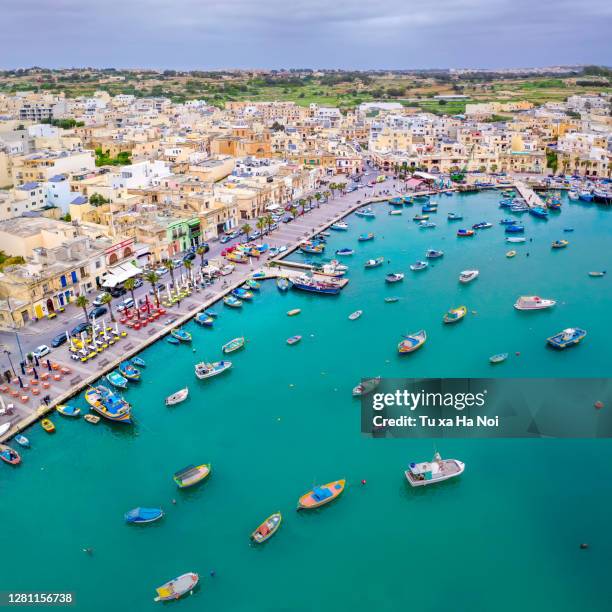 aerial view of pretty marsaxlokk harbour - marsaxlokk stockfoto's en -beelden