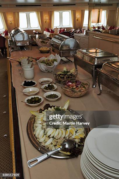 buffet meal in dining room onboard g.a.p adventures ms explorer cruise ship. (pr: property released) - cruise buffet stock pictures, royalty-free photos & images