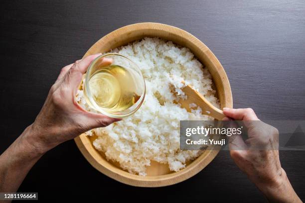 recipe for inari sushi, a traditional japanese home-cooked dish - sushi rice stock pictures, royalty-free photos & images