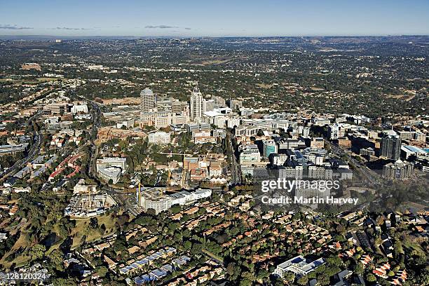 aerial view of sandton city to your left and the michelangelo towers to the right. gauteng province, south africa. - sandton johannesburg stock pictures, royalty-free photos & images