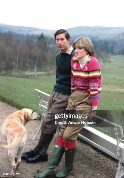 Prince Charles, Prince of Wales and his fiance Lady Diana Spencer, wearing an Inca jersey jumper with green corduroy trousers and Hunter wellies,...