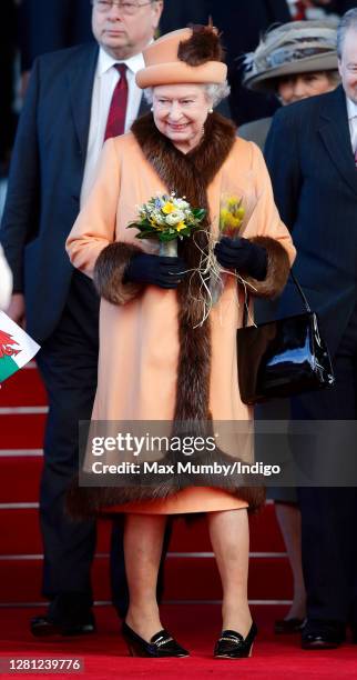 Queen Elizabeth II attends the official opening of the new National Assembly for Wales Building , home of the Welsh Parliament on March 1, 2006 in...