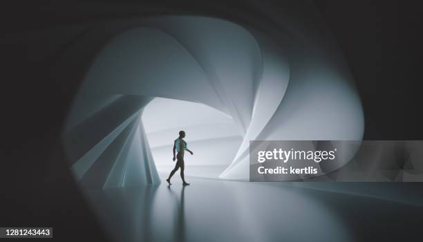 silhouette di un uomo - camminare in uno spazio futuristico - rendering 3d - galleria arte foto e immagini stock