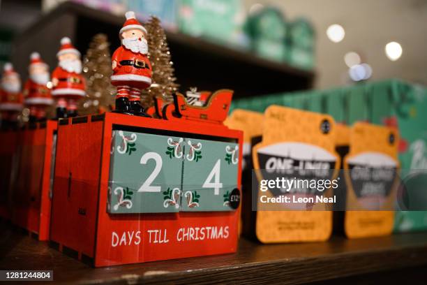 Christmas countdown calendar is seen among some of the festive items in the Christmas gift and decoration section in the branch of retailer Marks and...