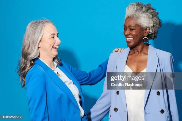 portrait of two confident, successful professional women - professional portrait ストックフォトと画像