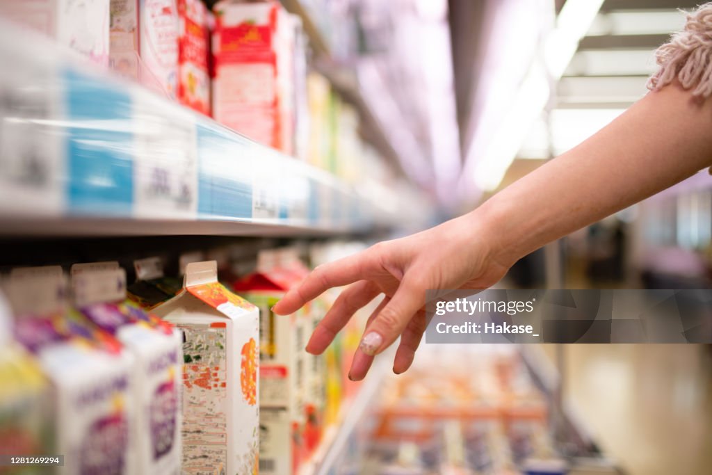 Women's hands shopping in a supermarket