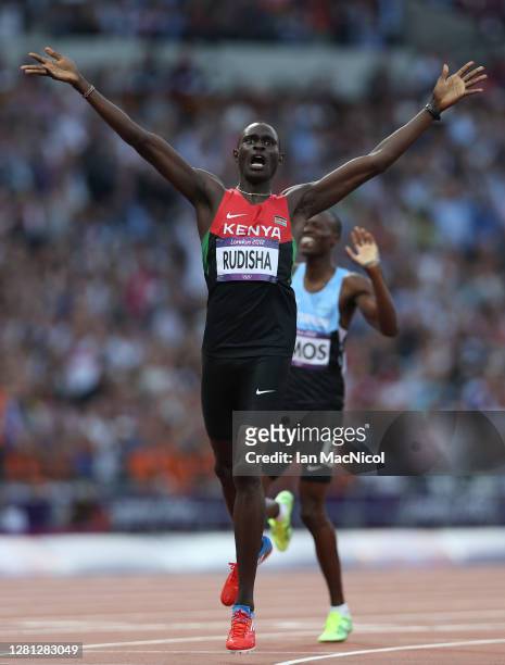 David Lekuta Rudisha of Kenya celebrates after winning gold and setting a new world record of 1:40.91 in the Men's 800m Final on Day 13 of the London...