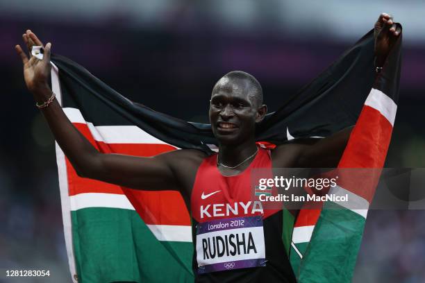 David Lekuta Rudisha of Kenya celebrates after winning gold and setting a new world record of 1:40.91 in the Men's 800m Final on Day 13 of the London...