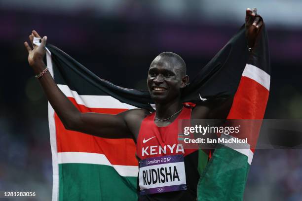 David Lekuta Rudisha of Kenya celebrates after winning gold and setting a new world record of 1:40.91 in the Men's 800m Final on Day 13 of the London...