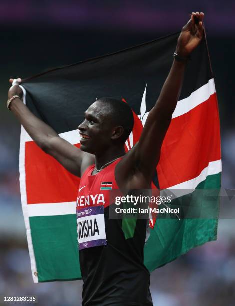 David Lekuta Rudisha of Kenya celebrates after winning gold and setting a new world record of 1:40.91 in the Men's 800m Final on Day 13 of the London...