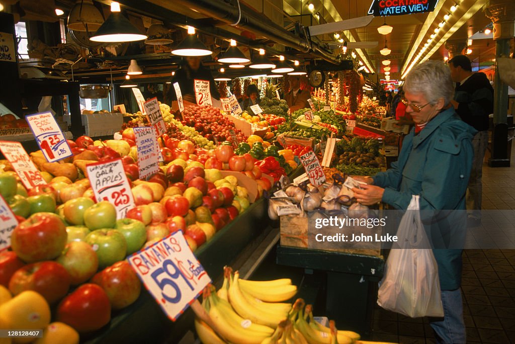 Woman shopping for fruit