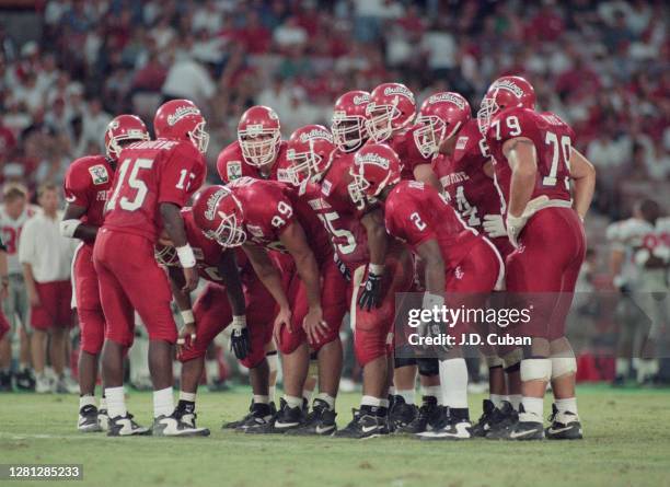 Adrian Claiborne Quarterback for the Fresno State Bulldogs instructs his offensive line in the huddle during the NCAA Big Ten Conference Disneyland...