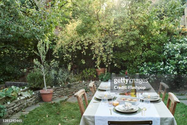 still life of a dressed dining table set for six people. - al fresco dining stock pictures, royalty-free photos & images