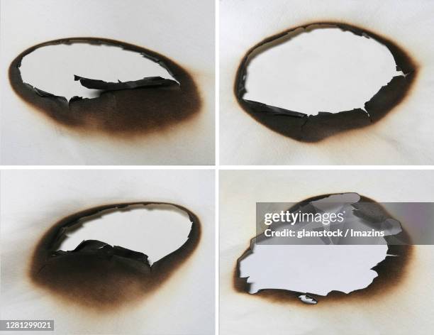 Burn Box Paper 36 Burn Hole Paper Stock Photos, High-Res Pictures, and Images - Getty ...