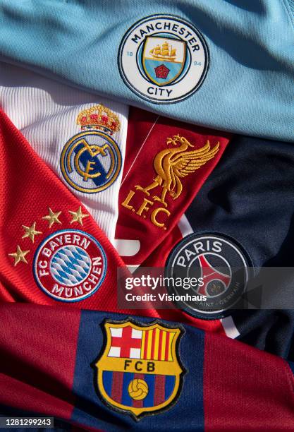 The badges of Manchester City, Bayern Munich, Real Madrid, Liverpool, Paris St-Germain and FC Barcelona, the top teams in the Champions League on...