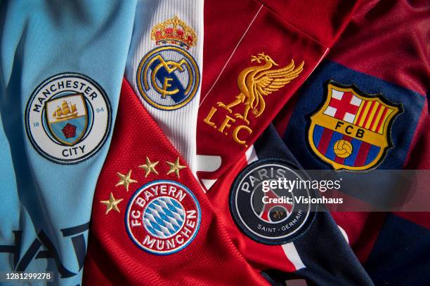 The badges of Manchester City, Bayern Munich, Real Madrid, Liverpool, Paris St-Germain and FC Barcelona, the top teams in the Champions League on...